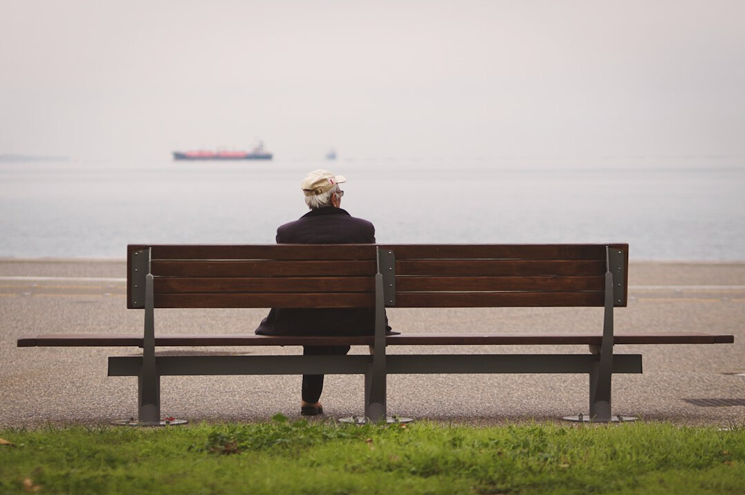 elderly man on bench