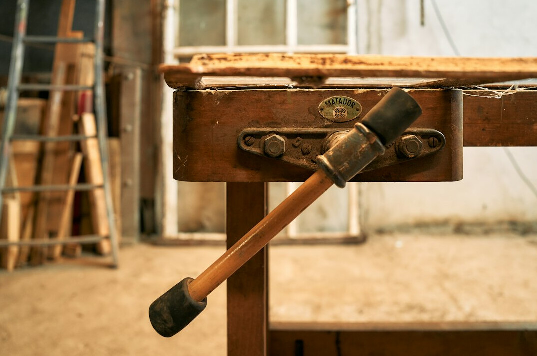 Danish craftsman working wood in a small workshop